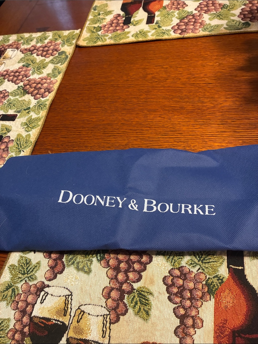 Dooney & Bourke Blue Pebbled Leather Satchel with Brown Trim and Gold Charm - Picture 9 of 9